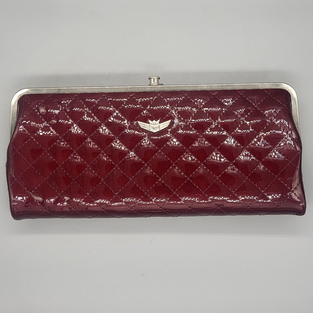 Consuela Candy Crush Patent Clamshell Clutch In Cayenne
